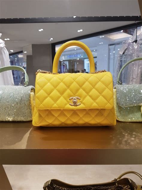 mustard yellow chanel bag|chanel coco bag with top handle.